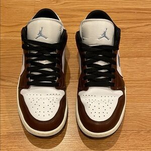 S-O-L-D.  
Jordan 1 retro low SE Brown Blue Gray Sneakers